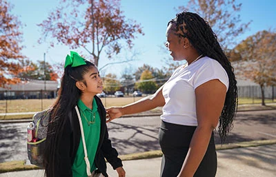A mentor working with a scholar